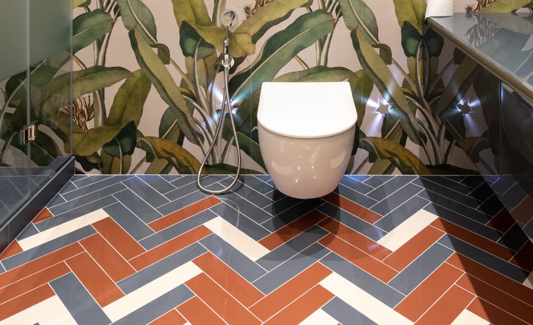 Two-tone herringbone floor tile