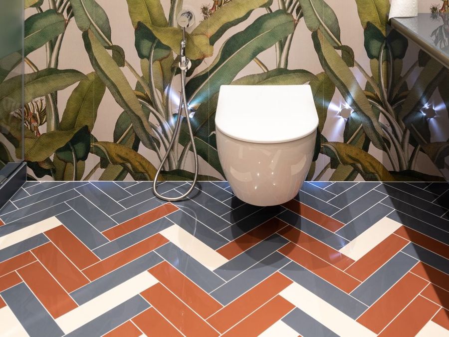 Two-tone herringbone floor tile